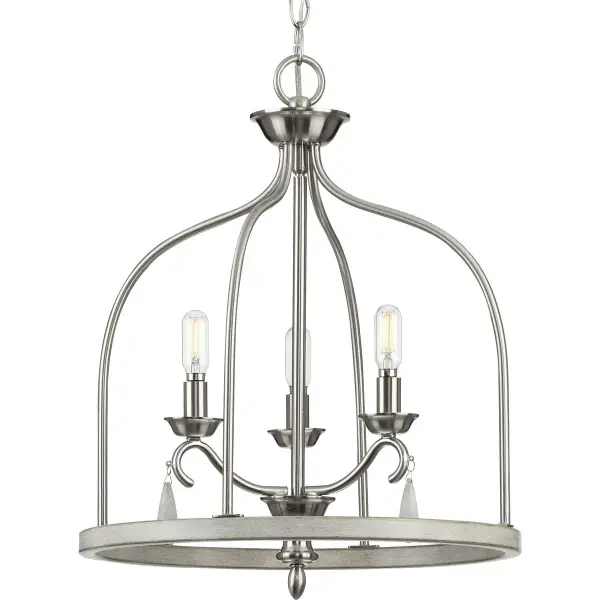 The Vinings three-light foyer pendant blends transitional elegance with coastal farmhouse warmth in a brushed nickel finish. Perfect for entryways and dining spaces, it provides ample illumination while maintaining a refined aesthetic.