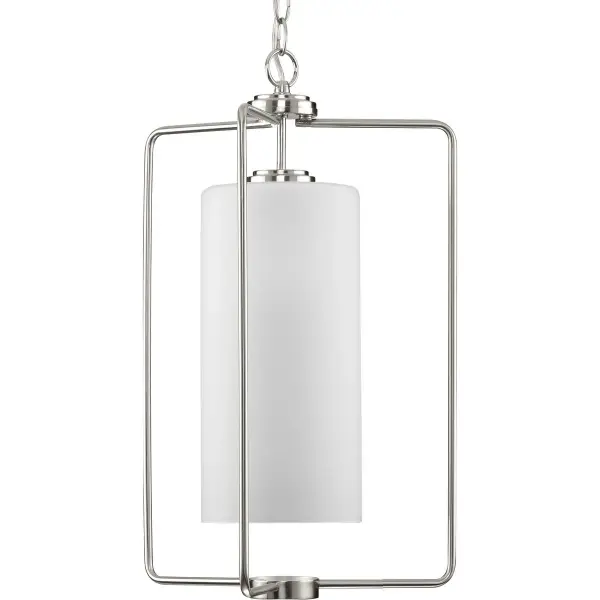 The Merry Collection pendant combines timeless etched glass with brushed nickel for a refined transitional look. Perfect for foyers and entryways, it provides soft, diffused lighting while maintaining a clean, contemporary aesthetic.