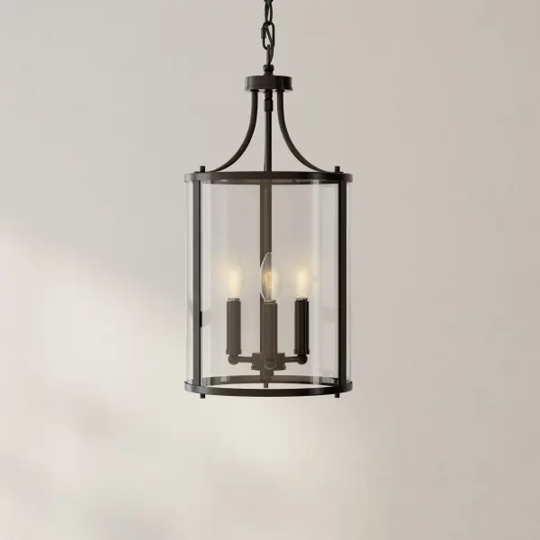 The Gilliam three-light pendant combines transitional elegance with farmhouse charm in a brushed nickel finish. Ideal for foyers, hallways, and dining areas, this fixture provides ample illumination while making a sophisticated design statement. - alternate view