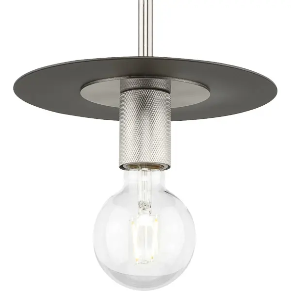 The Trimble mini pendant blends mid-century modern aesthetics with industrial charm. Its compact size and brushed nickel finish make it ideal for kitchen islands, dining areas, and bedrooms seeking refined style.