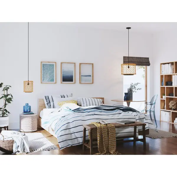 The Chandra pendant combines organic woven materials with a sleek matte black finish, creating a transitional fixture that bridges coastal and modern aesthetics. Its textured shade filters light beautifully while adding natural warmth to any space. - alternate view