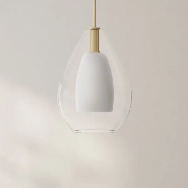 The Carillon Collection pendant offers a sophisticated blend of contemporary and farmhouse aesthetics in a large-scale format. Its brushed nickel finish provides versatility across multiple design schemes while maintaining a refined presence.
