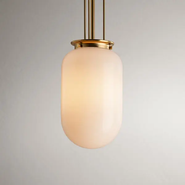 The Alisse pendant brings refined elegance to intimate spaces with its brushed gold finish and clean contemporary lines. Perfect for kitchen islands, bedrooms, or as a statement piece in smaller areas. - alternate view