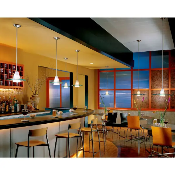 This elegant one-light pendant combines traditional etched glass with a brushed nickel finish for versatile appeal. The clear etched shade provides soft, diffused lighting ideal for intimate spaces and task areas. - alternate view