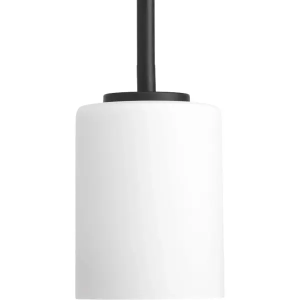The Replay mini-pendant combines brushed nickel hardware with etched white glass for a refined, contemporary look. Its compact size makes it perfect for kitchen islands, dining nooks, or clustered installations.