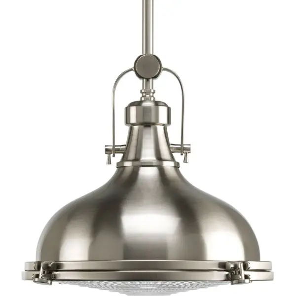 This coastal-inspired pendant features authentic fresnel glass that creates beautiful light diffusion patterns. The brushed nickel finish and energy-efficient LED technology combine maritime heritage with modern functionality.