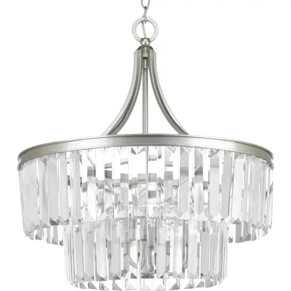 The Glimmer Collection pendant brings luxurious illumination with five clear glass shades and a refined Silver Ridge finish. Perfect for creating a focal point over dining tables or kitchen islands with its contemporary elegance.
