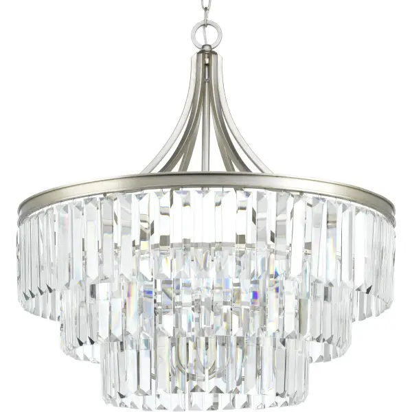 The Glimmer Collection pendant delivers dramatic impact with six lights in a sophisticated Silver Ridge finish. Perfect for high-ceiling spaces, this fixture combines modern design with luxe appeal.