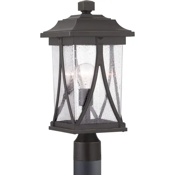 The Abbott Collection Post Lantern blends traditional craftsman design with contemporary clean lines. Its antique bronze finish and single-light configuration provide warm, welcoming illumination for outdoor spaces.