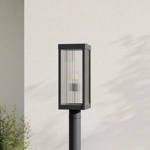 The Felton post lantern blends modern clean lines with craftsman detailing in a durable black finish. JA8 compliant for California energy standards, this fixture delivers both style and efficiency for residential and light commercial applications.