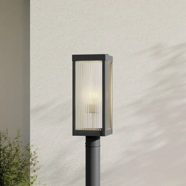 The Felton post lantern blends modern clean lines with craftsman detailing in a durable black finish. JA8 compliant for California energy standards, this fixture delivers both style and efficiency for residential and light commercial applications. - alternate view
