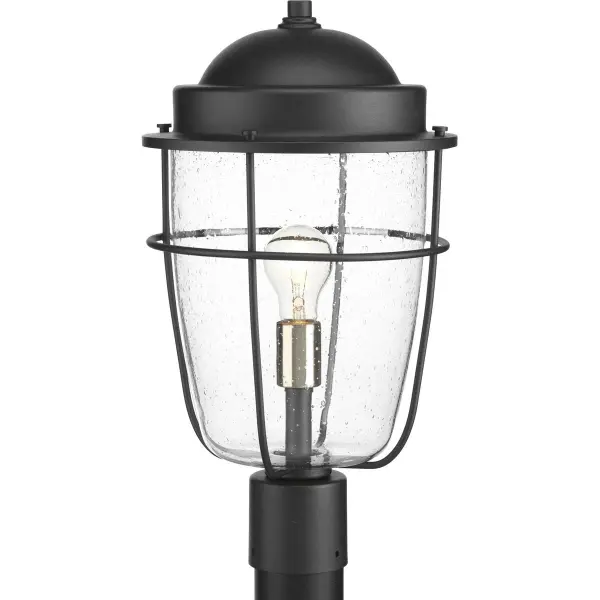 The Holcombe Post Lantern blends farmhouse authenticity with transitional versatility. Its black finish and clean lines work beautifully in coastal, urban, and traditional outdoor settings. JA8 compliant for California energy standards.