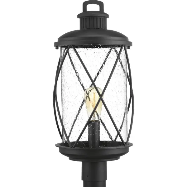 The Hollingsworth Post Lantern combines timeless farmhouse charm with contemporary outdoor durability. Its black finish and clean lines make it versatile for both residential and commercial settings.
