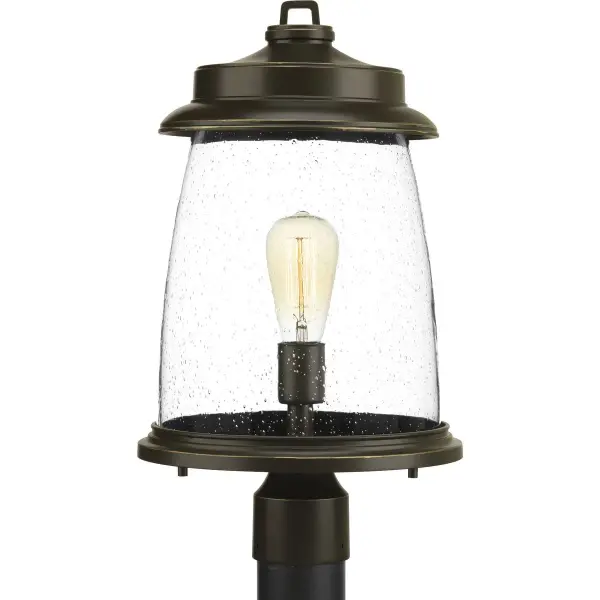 The Conover Collection Post Lantern combines traditional craftsmanship with transitional design, featuring an Antique Bronze finish that complements coastal and farmhouse aesthetics. JA8 compliant for California energy standards.