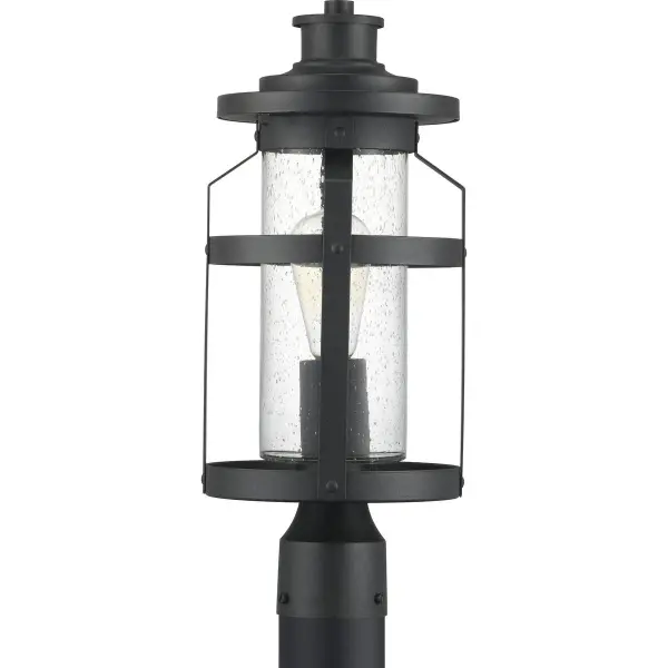 The Haslett post lantern brings rustic farmhouse charm to outdoor spaces with its antique pewter finish and clear glass panels. JA8 compliant for California energy standards, this fixture combines traditional styling with modern efficiency.