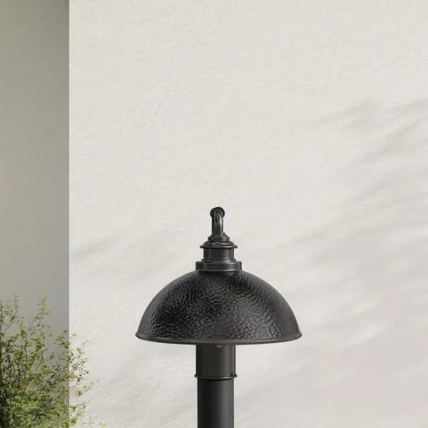 The Englewood post lantern combines timeless farmhouse charm with contemporary outdoor lighting performance. Its black finish and clear glass panels create welcoming illumination for entryways and pathways.