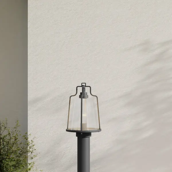 The Benton Harbor post lantern combines urban industrial style with coastal durability through DURASHIELD technology. Its black finish and clean lines make it versatile for modern outdoor spaces. - alternate view