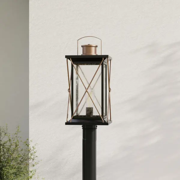 The Barlowe post lantern brings rustic farmhouse charm to outdoor spaces with its antique bronze finish and traditional lantern silhouette. JA8 compliant for California energy standards, perfect for porches and pathways.