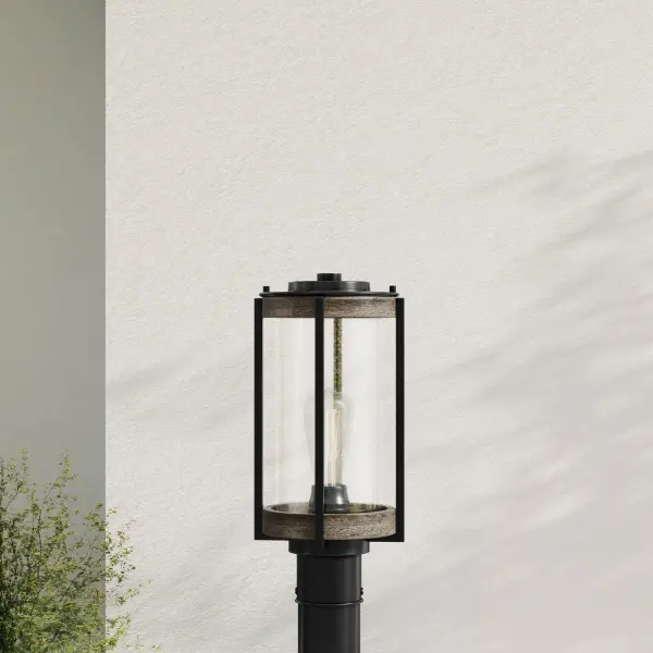 The Whitmire post light combines rustic farmhouse style with modern functionality. Its matte black finish and clear seeded glass create timeless curb appeal while meeting California Title 24 and JA8 compliance standards.