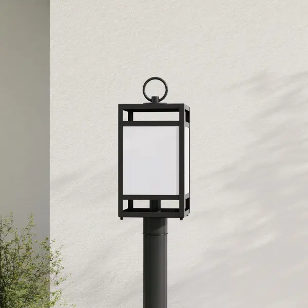 The Parrish post light combines transitional design with durable outdoor construction. Its matte black finish and clear etched glass create welcoming illumination for entryways and pathways while meeting California Title 24 standards.