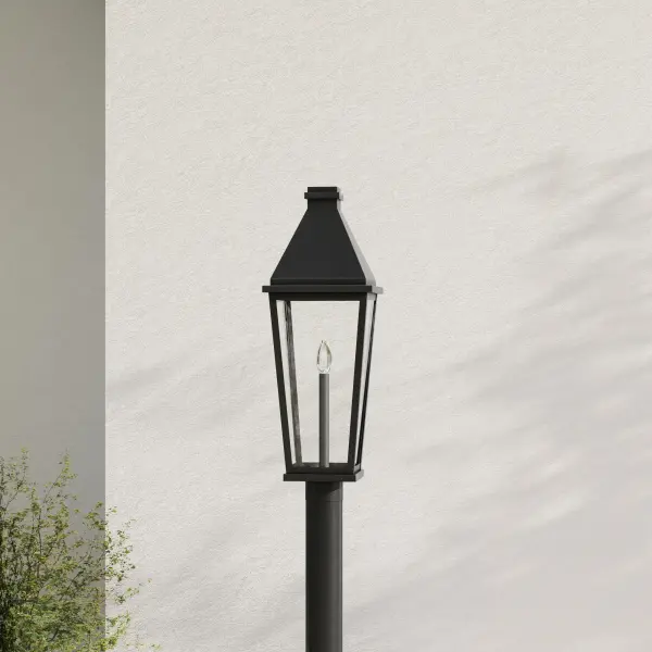The Richmond Hill post light combines clean modern lines with farmhouse charm, featuring clear glass panels that showcase the bulb while providing ample illumination. Its durable black finish and weather-resistant construction make it ideal for residential and commercial outdoor applications.