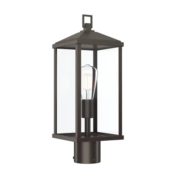 The Cantley outdoor wall light combines traditional design with durable outdoor construction. Its antique bronze finish and clear glass shade create a welcoming ambiance for entryways, porches, and patios.