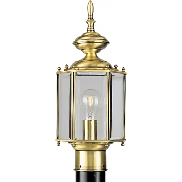 Illuminate your home with this remarkable brass finished post. Solid brass hexagonal post lantern with clear beveled glass panels. Collection: BrassGUARD Lantern Rooms: Outdoor Finish: Polished Brass Glass: Clear Beveled Notes: Fits 3 in. post (sold separately). Width: 7.00" Height: 16.38" Length: 7.00" Weight: 4.80 lb Wire: 6" Number of Bulbs: 1 Maximum Wattage: 100.00 W Bulb Type: A19 Bulb Base: E26 Light Source: Incandescent Voltage: 120.00 V Material: Solid Brass Country of Origin: CN Safety Listing: UL-CUL Safety Rating: Wet Title 20 Manufacturer Warranty: 1-year Limited Warranty Spec Sheet Instructions Parts Diagram
