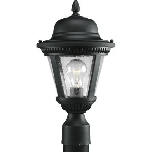 The Westport Post Lantern brings traditional elegance to outdoor spaces with its antique bronze finish and clear glass panels. Perfect for illuminating pathways, driveways, and entryways with classic charm.