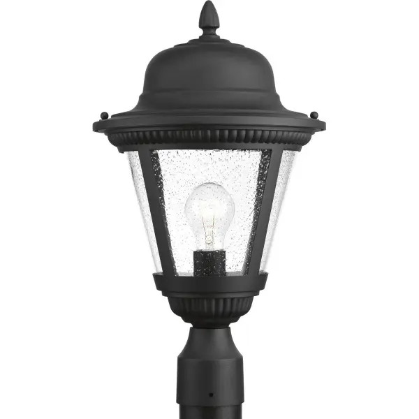The Westport post lantern brings traditional elegance to outdoor spaces with its antique bronze finish and clear glass panels. JA8 compliant for California energy standards, this medium-sized fixture provides reliable illumination for pathways, patios, and entryways. - alternate view