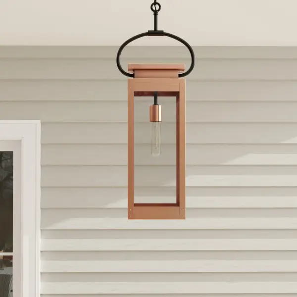The Union Square hanging lantern blends industrial design with farmhouse warmth, featuring durable stainless steel construction and clear glass panels. Perfect for covered outdoor areas, this one-light fixture adds vintage-inspired character while meeting JA8 energy efficiency standards.