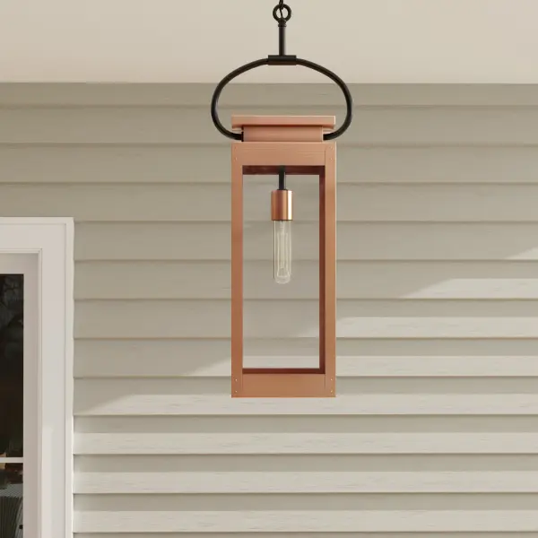 The Union Square hanging lantern blends industrial design with farmhouse warmth, featuring durable stainless steel construction and clear glass panels. Perfect for covered outdoor areas, this one-light fixture adds vintage-inspired character while meeting JA8 energy efficiency standards. - alternate view