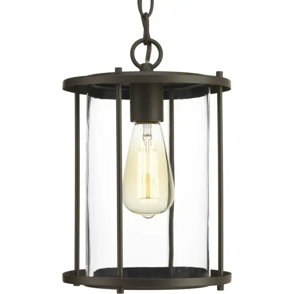 The Gunther Hanging Lantern combines traditional farmhouse styling with urban industrial accents in a durable outdoor fixture. Its antique bronze finish and lantern silhouette create welcoming ambiance for porches and patios.