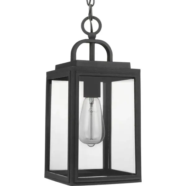 The Grandbury hanging lantern combines timeless transitional design with modern durability. Its Antique Bronze finish and clear glass panels create warm, welcoming illumination for covered outdoor spaces.