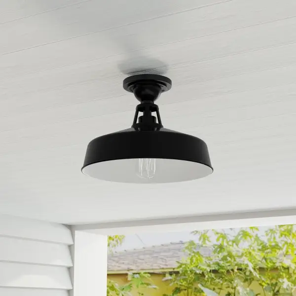 The Cedar Springs semi-flush mount combines rustic farmhouse charm with industrial edge in a durable black finish. JA8 compliant and rated for outdoor use, it's perfect for porches, patios, and entryways.