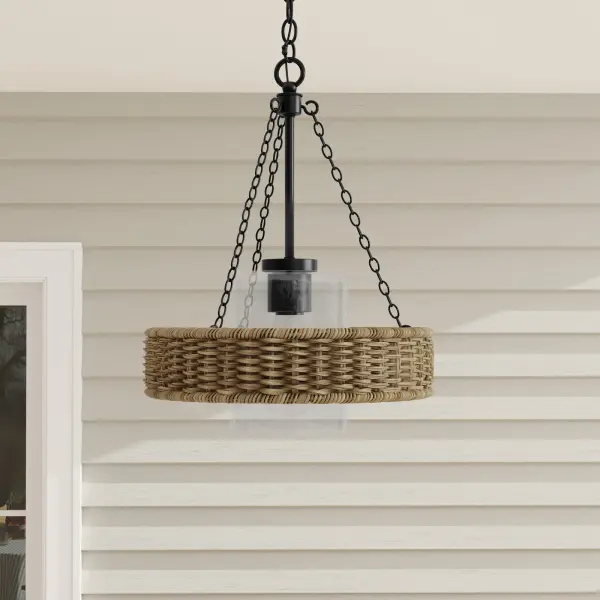 The Pembroke outdoor pendant combines transitional design with coastal influences, featuring a durable matte black finish. At 18.5 inches, it's perfectly sized for covered porches, patios, and entryways.
