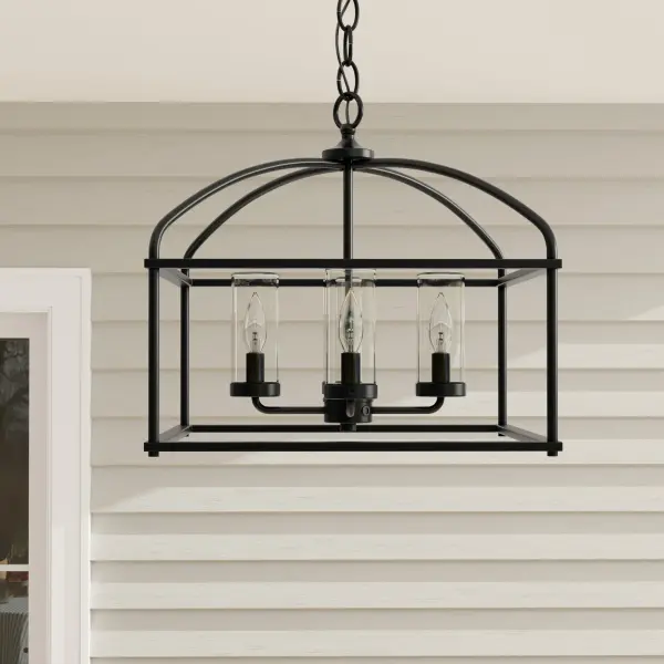 The Swansea outdoor chandelier combines rustic farmhouse style with weather-resistant construction. Its 18-inch profile makes it ideal for covered porches and smaller outdoor spaces while providing four-light illumination.
