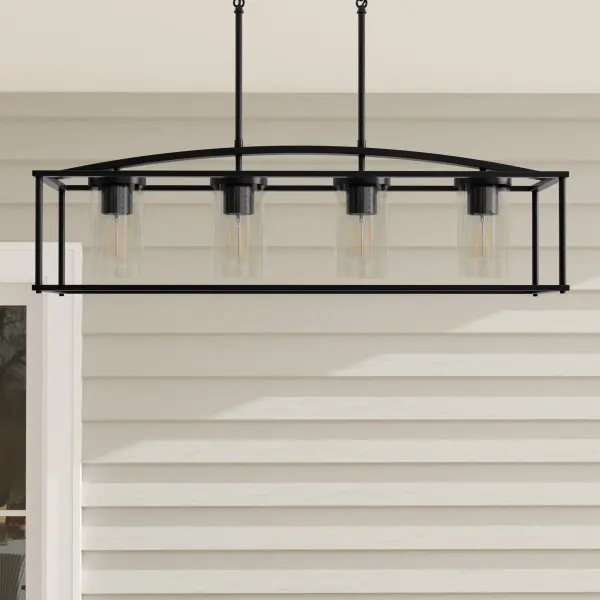 The Swansea outdoor chandelier combines rustic farmhouse charm with weather-resistant construction. Its generous 36-inch width and four-light design make it perfect for covered porches, patios, and large entryways.