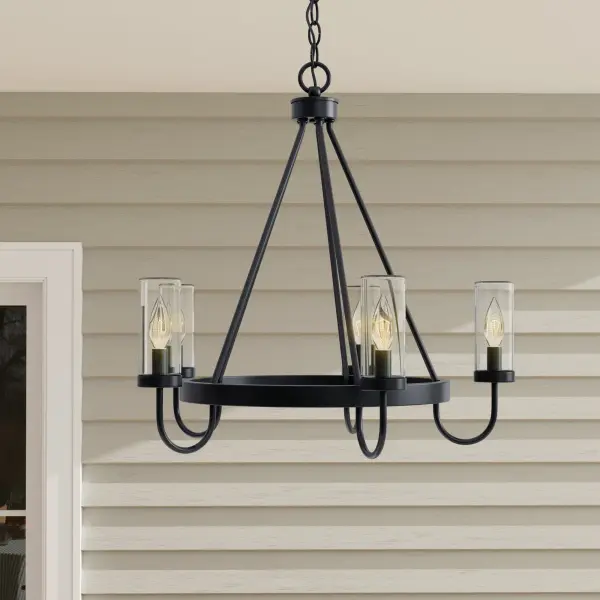 The Swansea outdoor chandelier combines rustic farmhouse style with weather-resistant construction. Its 24-inch round design and four-light configuration provide ample illumination for covered outdoor spaces while adding architectural interest. - alternate view