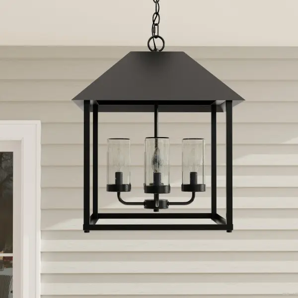 The Chapel Collection blends modern craftsman style with farmhouse appeal in a weather-resistant four-light pendant. Perfect for covered outdoor spaces, this fixture combines transitional design with Title 24 compliance for California installations.