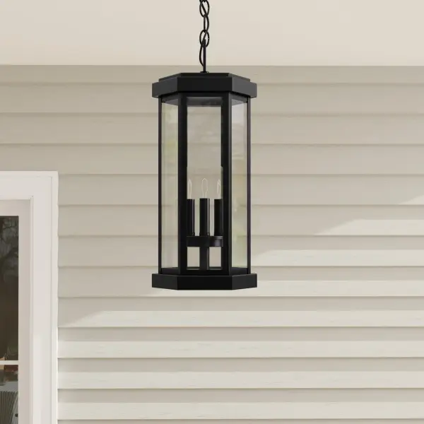The Ramsey Collection brings timeless farmhouse style to outdoor spaces with its clean-lined black metal frame and clear glass panels. JA8 compliant for California energy standards, this versatile lantern works beautifully on covered porches and patios.
