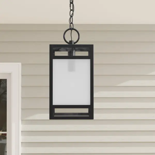 The Parrish hanging lantern combines timeless design with contemporary finishes. Clear etched glass provides warm ambient lighting while the matte black finish adds modern sophistication to any outdoor space.
