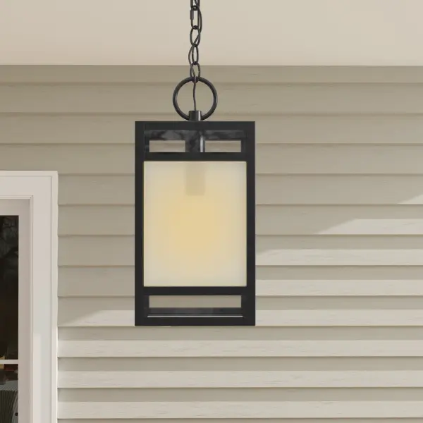 The Parrish hanging lantern combines timeless design with contemporary finishes. Clear etched glass provides warm ambient lighting while the matte black finish adds modern sophistication to any outdoor space. - alternate view