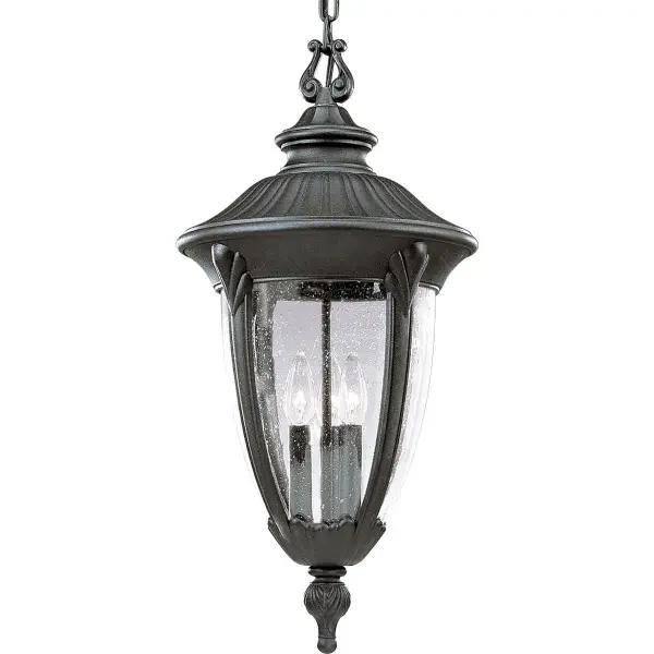 The Meridian three-light hanging lantern combines traditional design with modern outdoor durability. Its textured black finish and clear glass panels create welcoming illumination for covered outdoor spaces.