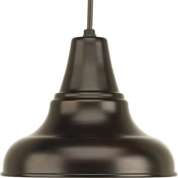 The District Collection lantern blends urban industrial style with farmhouse warmth, featuring an antique bronze finish perfect for outdoor spaces. Its medium size makes it versatile for porches, patios, and entryways.