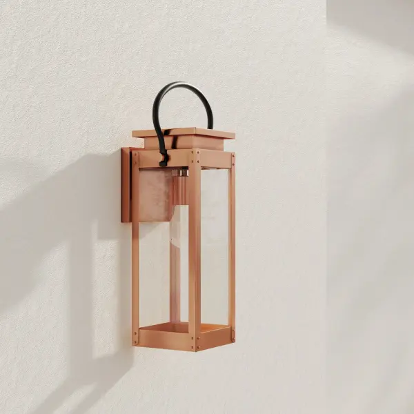 The Union Square wall lantern blends urban industrial style with farmhouse warmth in a durable stainless steel finish. Perfect for modern exteriors seeking character with clean lines and weather-resistant construction.