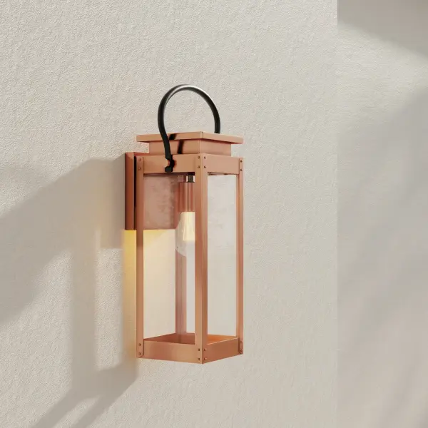 The Union Square wall lantern blends urban industrial style with farmhouse warmth in a durable stainless steel finish. Perfect for modern exteriors seeking character with clean lines and weather-resistant construction. - alternate view