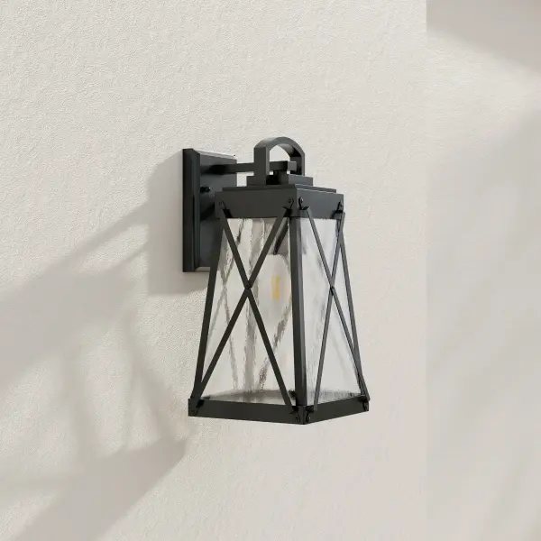 The Creighton wall lantern delivers timeless farmhouse style with a durable black finish perfect for outdoor spaces. Its medium size makes it versatile for porches, patios, and entryways while providing reliable illumination.