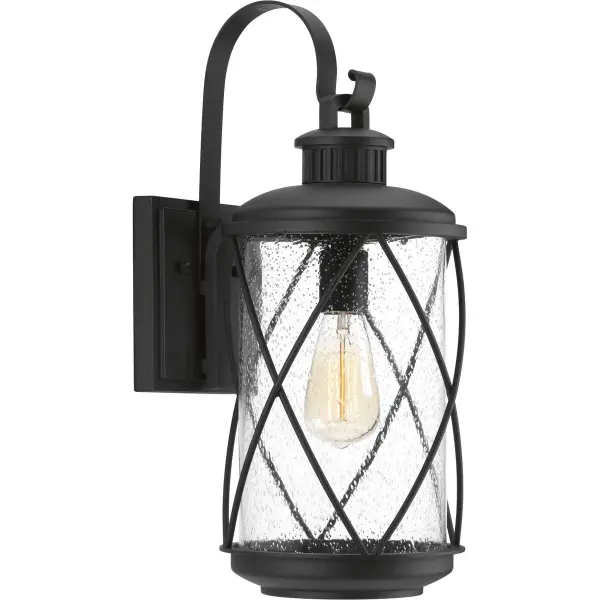 The Hollingsworth Medium Wall Lantern combines timeless farmhouse style with contemporary outdoor performance. Its black finish and clean lines complement both traditional and transitional exteriors while providing reliable illumination.