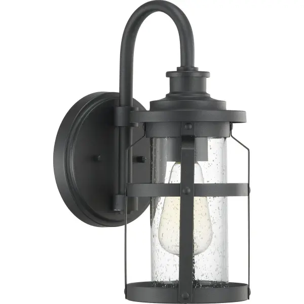 The Haslett Small Wall Lantern brings rustic farmhouse style to your exterior with its clean black finish and traditional lantern silhouette. Perfect for porches, patios, and entryways seeking timeless appeal.