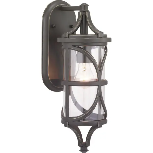 The Morrison wall lantern brings traditional charm to compact outdoor spaces with its antique bronze finish and clear glass panels. Perfect for flanking doorways or illuminating smaller porches and patios. - alternate view